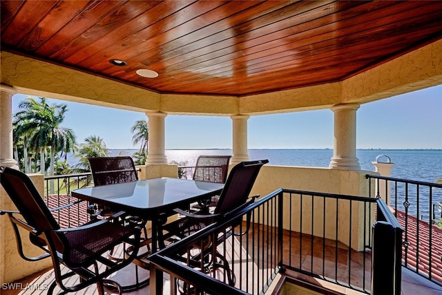 2704 Shriver Dr, Fort Myers, FL 33901 - balcony with a water view and outdoor dining area