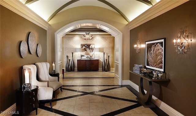 corridor featuring vaulted ceiling and a chandelier