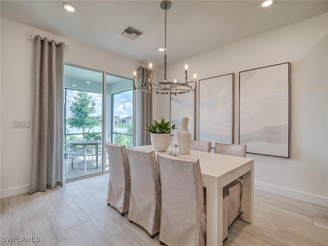 dining room with a chandelier