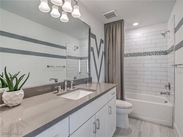 full bathroom with toilet, vanity, and shower / tub combo with curtain