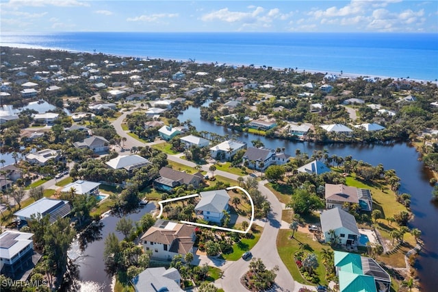 bird's eye view with a water view