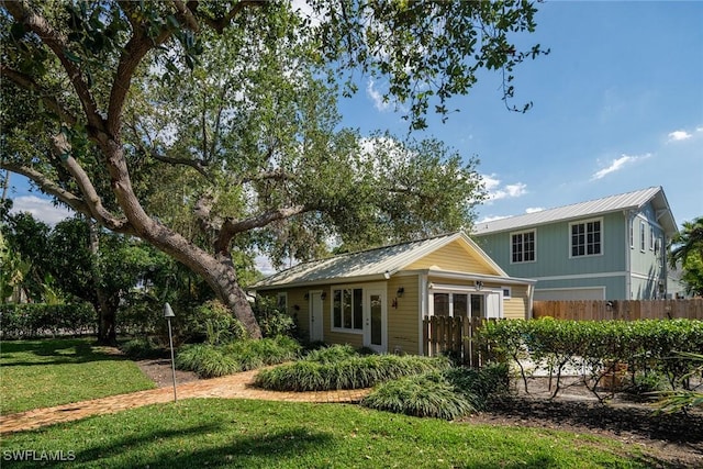 view of front of home with a front yard