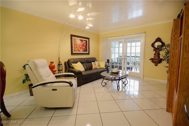 tiled living room featuring ornamental molding and french doors