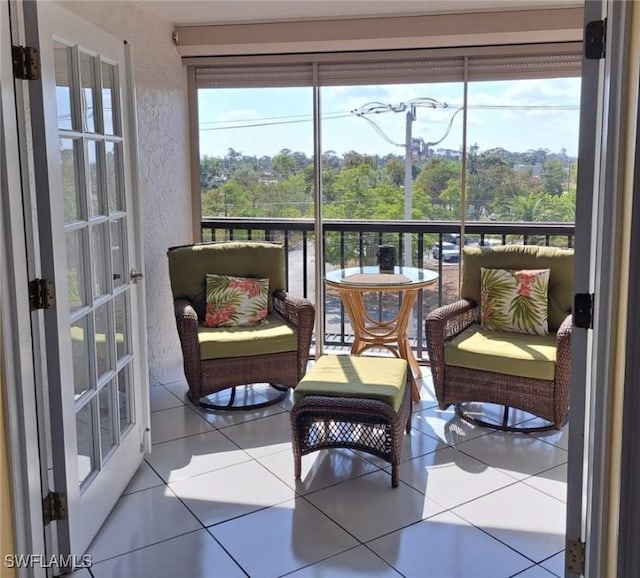 sunroom / solarium featuring plenty of natural light