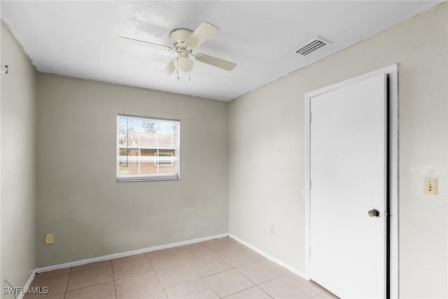 6135 Markland Ave, Fort Myers, FL 33916 - spare room with light tile patterned floors, baseboards, a ceiling fan, and visible vents