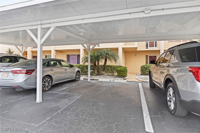 view of parking with a carport