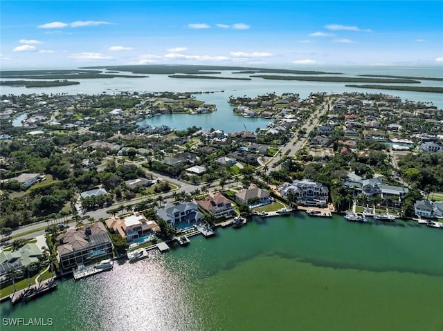 bird's eye view with a water view