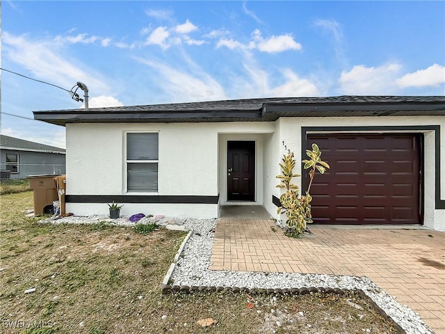 view of front of home featuring a garage