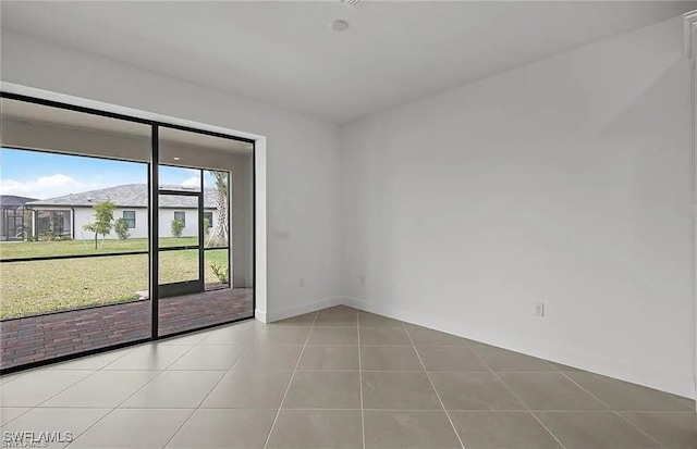 view of tiled spare room