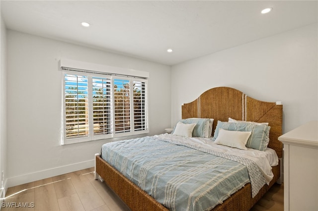 bedroom featuring light wood-type flooring