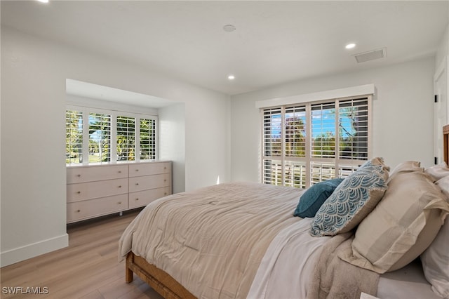 bedroom featuring light wood-type flooring