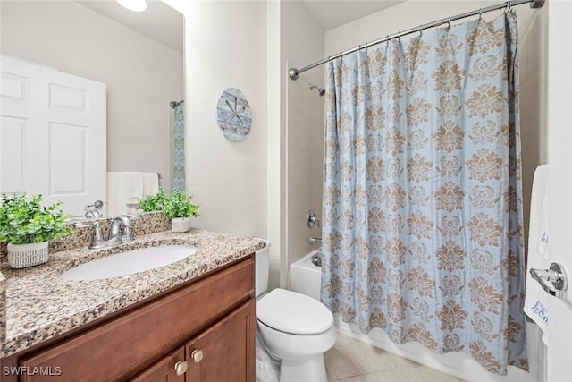 full bathroom featuring tile patterned flooring, vanity, toilet, and shower / bath combo with shower curtain