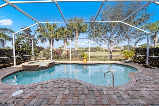 view of pool with a pool with connected hot tub, glass enclosure, and a patio