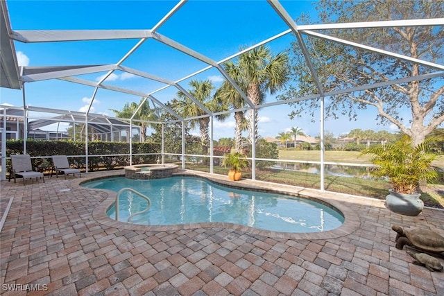 15056 Lure Trl, Bonita Springs, FL 34135 - view of swimming pool with a patio, a pool with connected hot tub, a water view, and a lanai