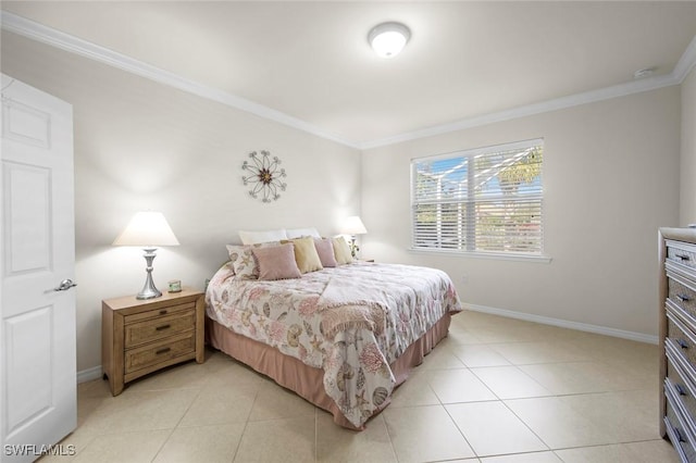 bedroom featuring ornamental molding, light tile patterned flooring, and baseboards