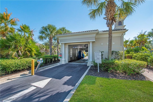 garage with aphalt driveway