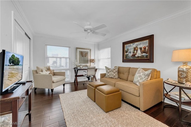 living room with ceiling fan and ornamental molding