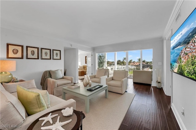 living room featuring ornamental molding and dark hardwood / wood-style flooring