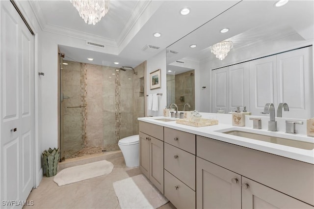 bathroom with crown molding, vanity, a notable chandelier, toilet, and walk in shower