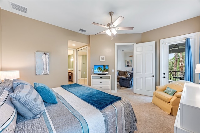 carpeted bedroom with access to exterior, ensuite bath, and ceiling fan