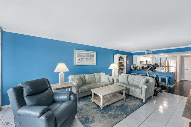 living room with light tile patterned floors