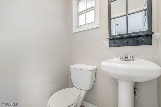 bathroom featuring toilet