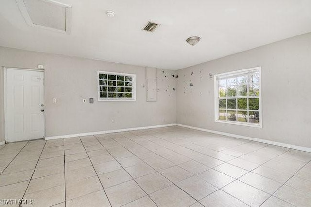 view of tiled spare room