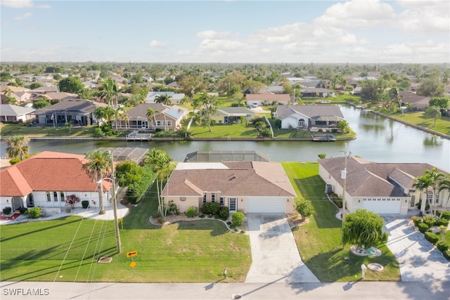 drone / aerial view with a water view