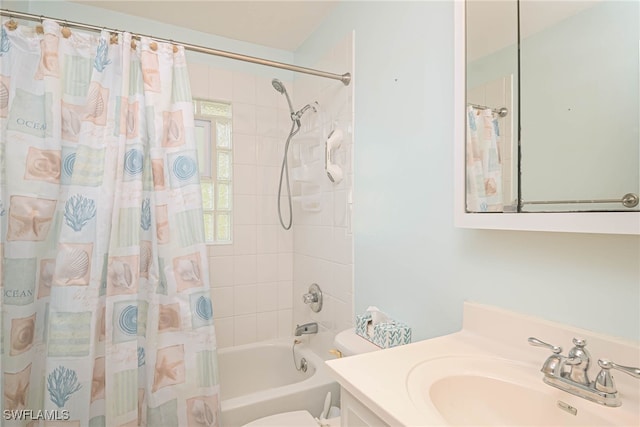 full bathroom with vanity, toilet, and shower / bath combo with shower curtain