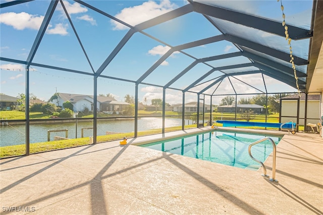 view of pool featuring a lanai, a patio, and a water view