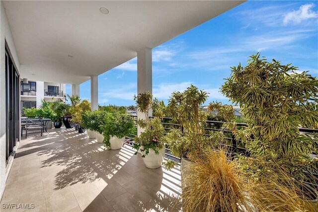 view of patio with a balcony