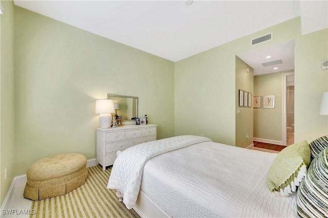1115 Central Ave Unit 457, Naples, FL 34102 - bedroom with recessed lighting, baseboards, and visible vents