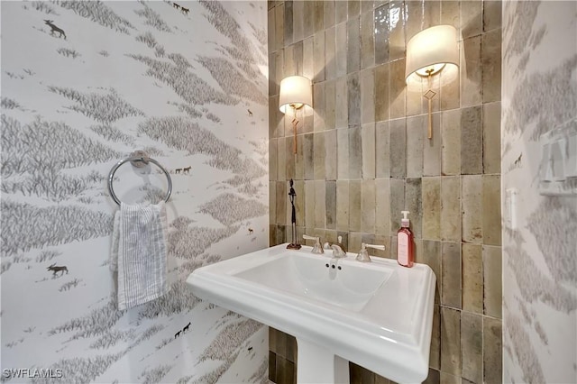 1115 Central Ave Unit 457, Naples, FL 34102 - bathroom featuring a sink and tile walls