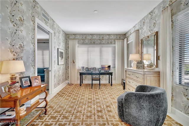1115 Central Ave Unit 457, Naples, FL 34102 - sitting room with baseboards, visible vents, and wallpapered walls
