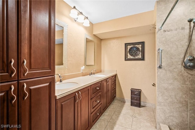 bathroom with vanity and tile patterned flooring