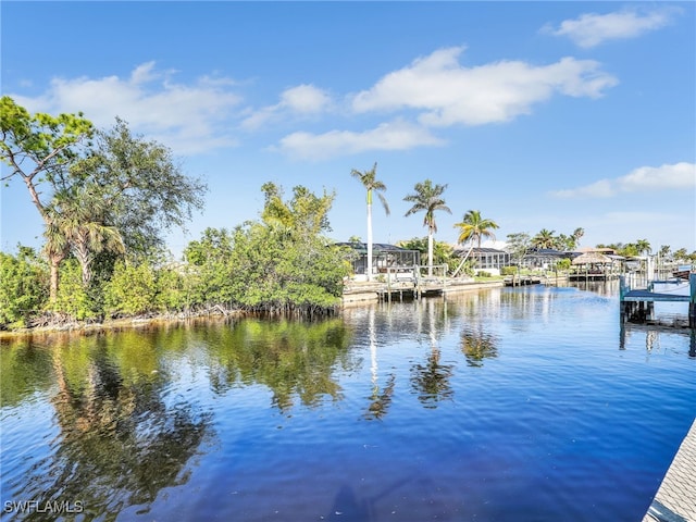 property view of water featuring a dock