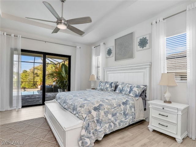 bedroom featuring ceiling fan and access to outside