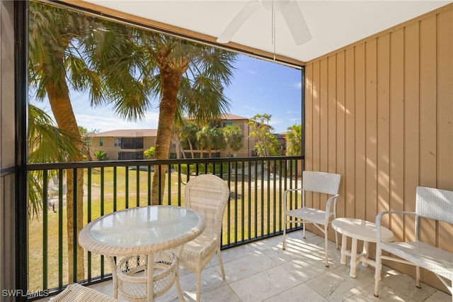 balcony featuring ceiling fan