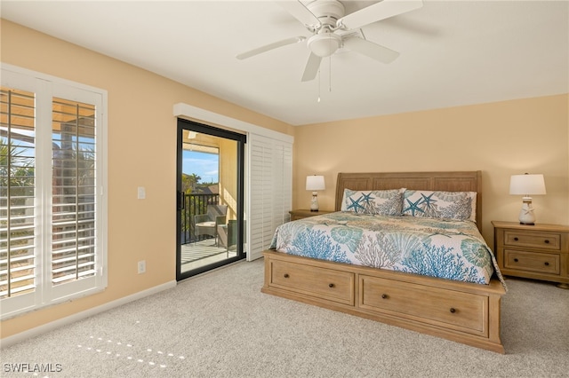 carpeted bedroom featuring ceiling fan and access to outside