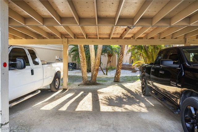 garage featuring a carport