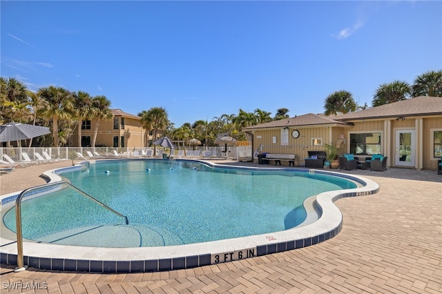 view of pool featuring a patio area