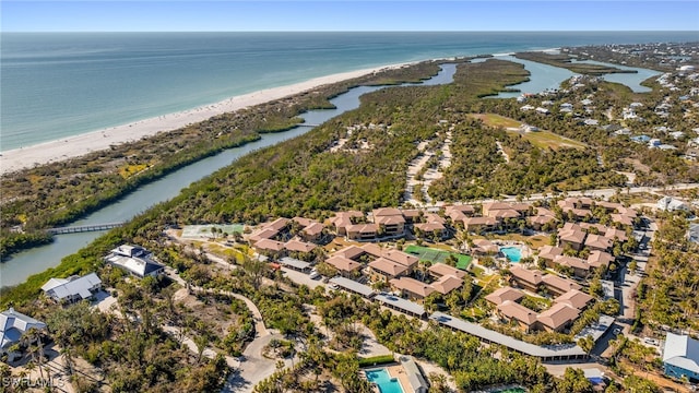 bird's eye view with a water view and a view of the beach