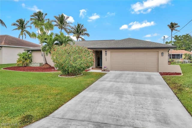 view of front of home with a garage and a front yard