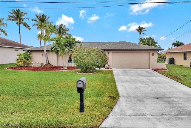 single story home featuring a garage and a front lawn