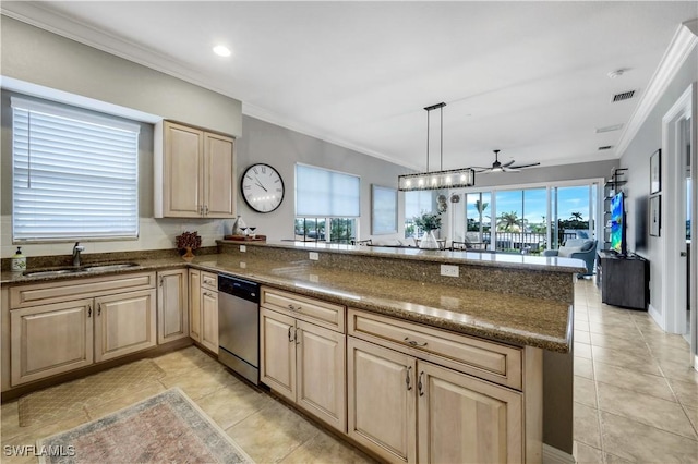 kitchen featuring sink, decorative light fixtures, stainless steel dishwasher, kitchen peninsula, and a wealth of natural light