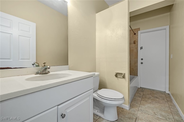 full bathroom with vanity, tiled shower / bath, and toilet