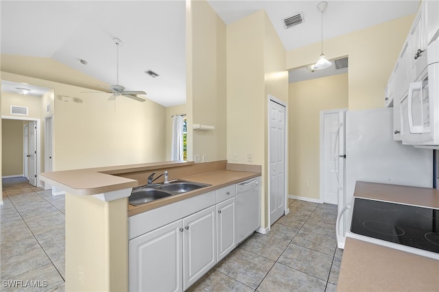 kitchen with white cabinetry, sink, hanging light fixtures, kitchen peninsula, and white appliances