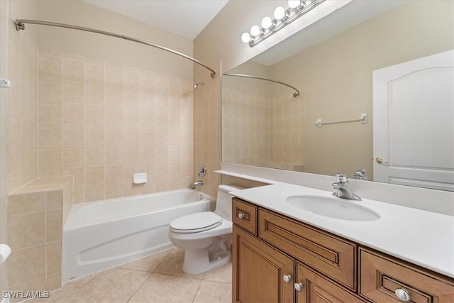 full bathroom featuring tile patterned flooring, vanity, toilet, and bathing tub / shower combination