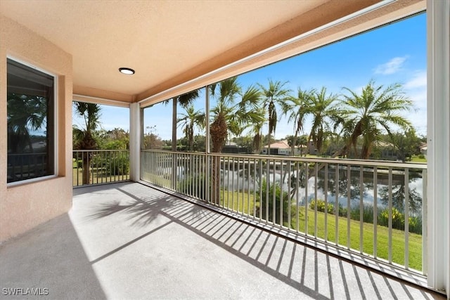 balcony featuring a water view