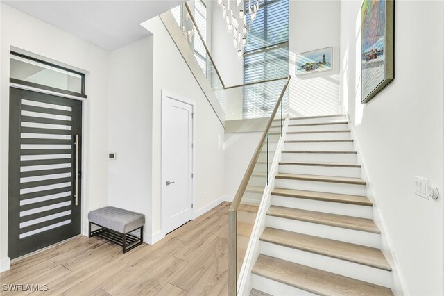 stairway featuring hardwood / wood-style flooring